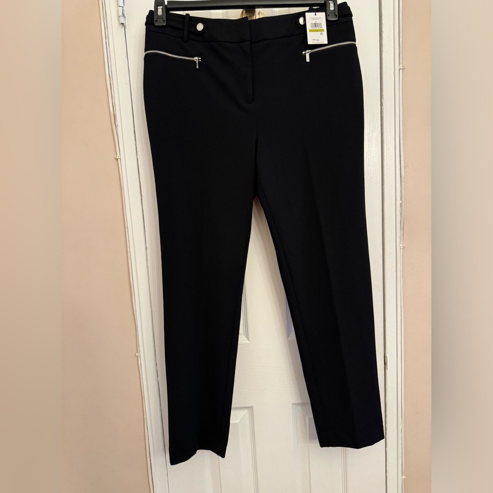 Black Calvin Klein straight leg slacks. Size 14. Brand new; never worn.